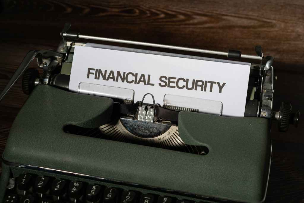 paper about financial security in a typewriter